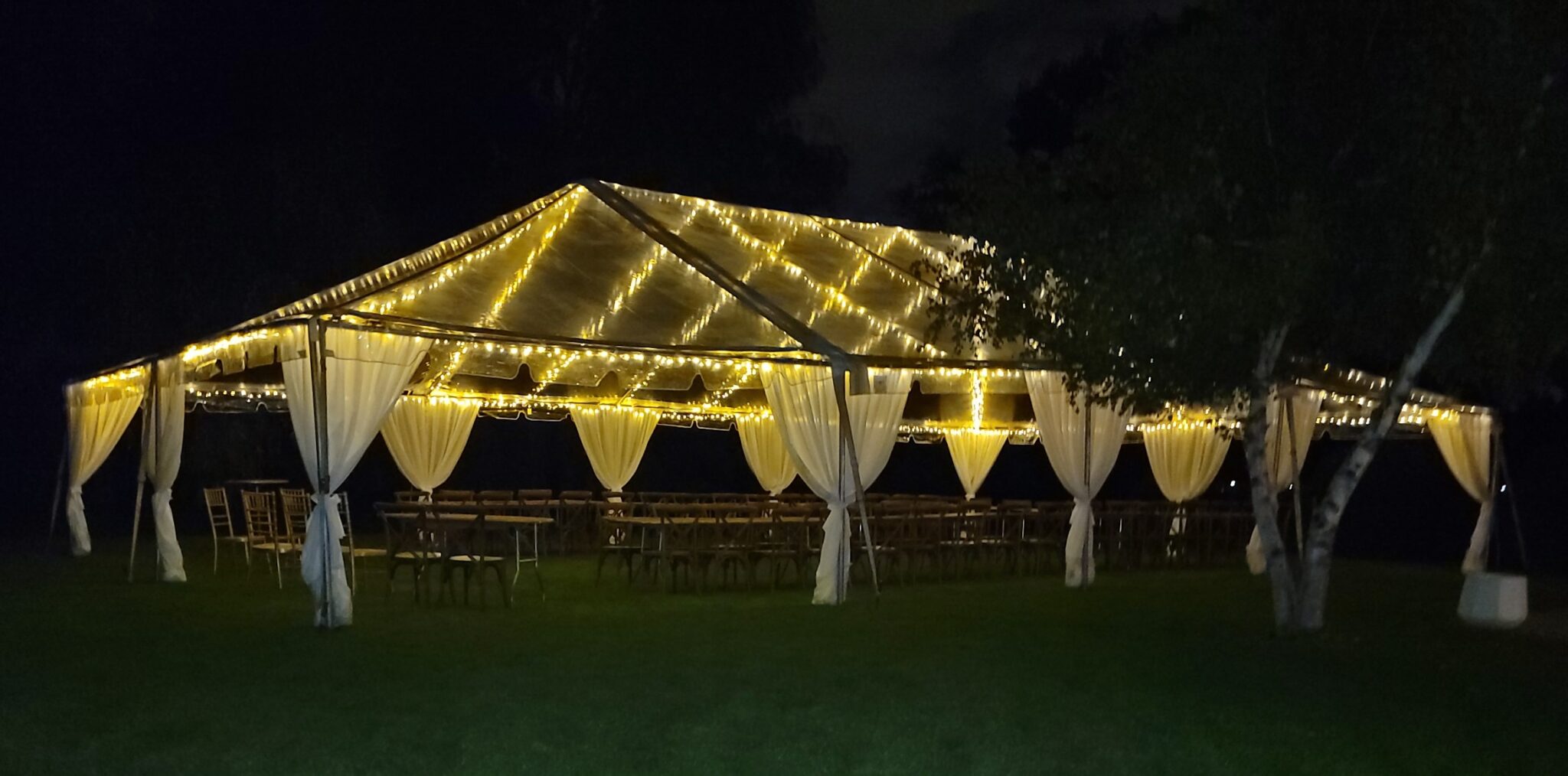 30x50 Clear Tent at Night with Italian Ice Lights & Curtain Fabric Legs